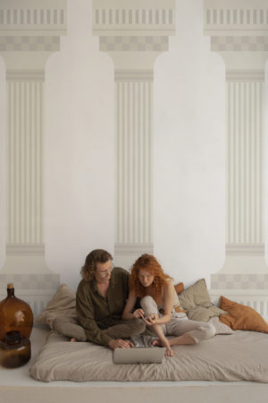 beige bedroom wallpaper with a trendy panoramic revisited column