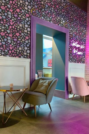 Multicoloured public space floral wallpaper thousand flowers spring trend