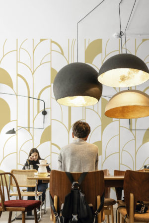 espace public doré papier peint géométrique demi arche art déco panoramique
