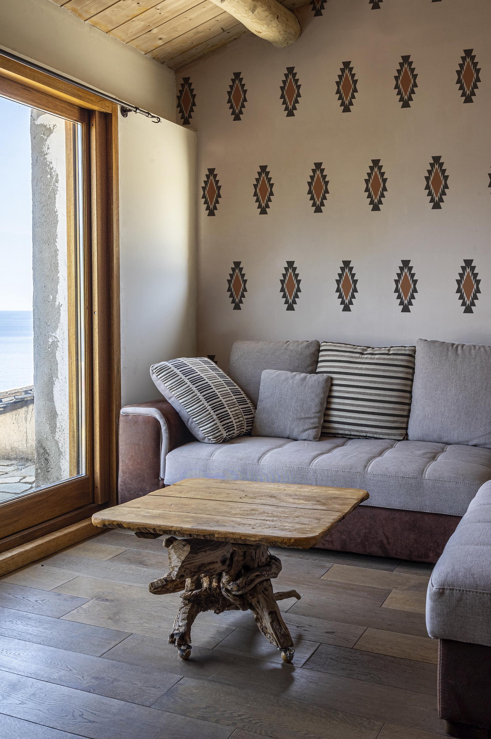 Living room terracotta geometric ethnic Aztec wallpaper